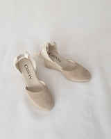 alpargatas con cuña alta y cintas en piel serraje beige hechas a mano en España