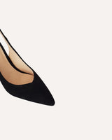 Stilettos destalonados en piel negra. La altura perfecta para cualquier evento