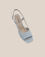 Sandalias en piel trenzada color blanco con tacón midi de 4,5 cm. Ideal para todo el día.