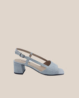 Sandalias en piel trenzada color blanco con tacón midi de 4,5 cm. Ideal para todo el día.