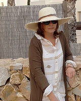 Sombrero en paja natural con ala ancha deshilachada. Cassani made in spain