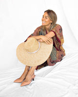 Zapatos de salón destalonado en piel napa color nude, con tacón midi y punta fina. Cassani Made in Spain