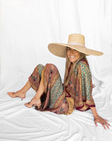 Zapatos de salón destalonado en piel napa color nude, con tacón midi y punta fina. Cassani Made in Spain