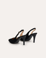 Stilettos destalonados en piel negra. La altura perfecta para cualquier evento