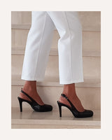 Zapatos de salón destalonados Cassani  en piel negra. Tacón alto con plataforma