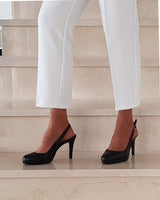 Zapatos de salón destalonados Cassani  en piel negra. Tacón alto con plataforma