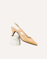 Zapatos de salón destalonado en piel napa color nude, con tacón midi y punta fina. Cassani Made in Spain