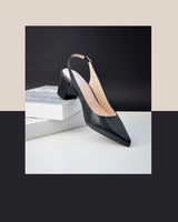 zapatos de salón destalonado en piel negra. Tacón midi ancho. Fabricado en España