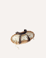 Capazo de mimbre pequeño con forro de algodón y cierre con cordones Cassani  made in Spain
