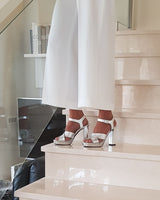 sandalias plataforma y tacón alto en piel plateada fabricadas a mano en España